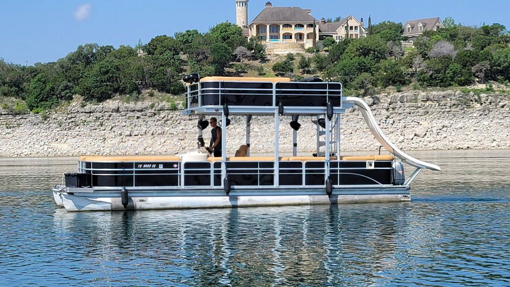 19 passenger 31ft Skyfall luxury tritoon with slide on Lake Travis