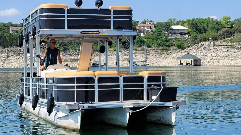 19 passenger 31ft Skyfall luxury tritoon with slide on Lake Travis