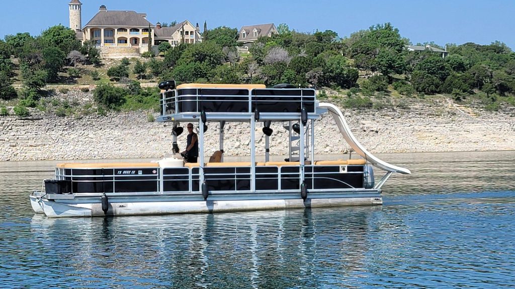 19 passenger 31ft Skyfall luxury tritoon with slide on Lake Travis
