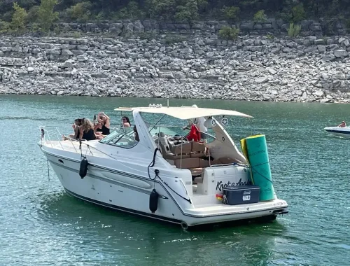 Yacht named "Knot Again" achored in Devil's Cove hosting a bachelorette party