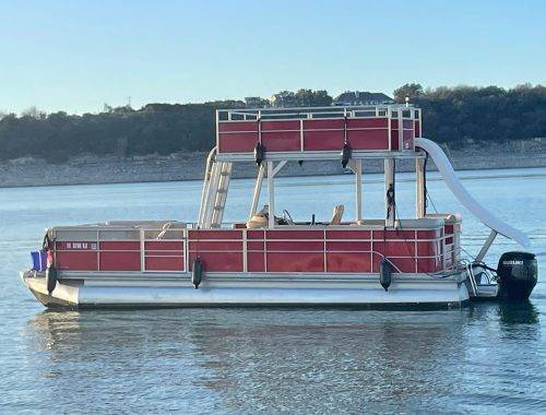 Seas The Day & Tequila Sunrise are 15 Passenger Party Boat on Lake Travis with Slide