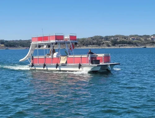 Shenanigans – 19 passenger party boat with slide at Lake Travis Yacht Rentals Shenanigans - 19 passenger party boat with slide at Lake Travis Yacht Rentals