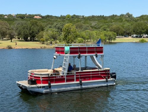 Aquaholic is a 13 Passenger Party Boat on Lake Travis with Slide